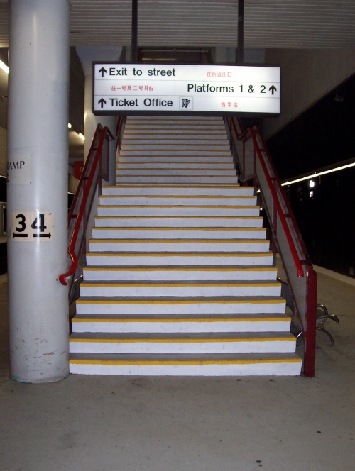 Jaxxon coatings used for non-slip industrial epoxy flooring on railway station platform and platform stairs.
