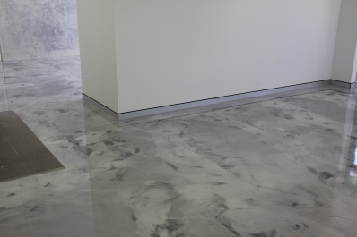 The entire downstairs area of the commercial office was covered with the beautiful metallic epoxy floor.